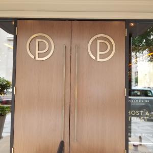 Brass Logo Installation - Restaurant Front Doors